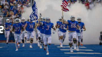 Sep 10, 2021; Boise, Idaho, USA; Boise State Broncos bring the American flag onto the field prior to the game against the UTEP Miners at Albertsons Stadium. Mandatory Credit: Brian Losness-USA TODAY Sports