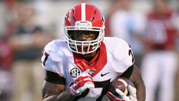 Oct 18, 2014; Little Rock, AR, USA; Georgia Bulldogs tailback Nick Chubb (27) rushes against the Arkansas Razorbacks at War Memorial Stadium. Georgia defeated Arkansas 45-32. Mandatory Credit: Nelson Chenault-USA TODAY Sports
