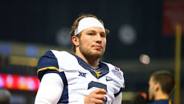 Jan 2, 2016; Phoenix, AZ, USA; West Virginia Mountaineers quarterback Skyler Howard (3) on the sidelines against the Arizona State Sun Devils in the Cactus Bowl at Chase Field. Mandatory Credit: Mark J. Rebilas-USA TODAY Sports