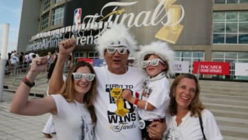 Jun 10, 2014; Miami, FL, USA; (From left to right) Miami Heat fans Katie Jones, Anthony Philosopho, Kaege Jones, and Kim Philosopho cheer outside the stadium prior to game three against the San Antonio Spurs in the 2014 NBA Finals at American Airlines Arena. Mandatory Credit: Robert Mayer-USA TODAY Sports