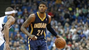 Feb 19, 2014; Minneapolis, MN, USA; Indiana Pacers forward Paul George (24) against the Minnesota Timberwolves at Target Center. The Timberwolves defeated the Pacers 104-91. Mandatory Credit: Brace Hemmelgarn-USA TODAY Sports