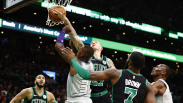 BOSTON, MASSACHUSETTS - DECEMBER 22: Daniel Theis #27 of the Boston Celtics blocks Terry Rozier #3 of the Charlotte Hornets during the first quarter of the game at TD Garden on December 22, 2019 in Boston, Massachusetts. NOTE TO USER: User expressly acknowledges and agrees that, by downloading and or using this photograph, User is consenting to the terms and conditions of the Getty Images License Agreement. (Photo by Omar Rawlings/Getty Images)