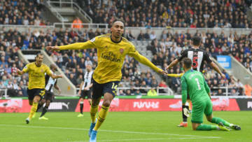 NEWCASTLE UPON TYNE, ENGLAND - AUGUST 11: Pierre-Emerick Aubameyang of Arsenal celebrates after scoring his team's first goal during the Premier League match between Newcastle United and Arsenal FC at St. James Park on August 11, 2019 in Newcastle upon Tyne, United Kingdom. (Photo by Stu Forster/Getty Images)
