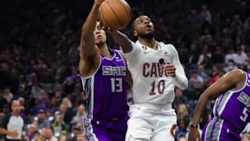 Nov 9, 2022; Sacramento, California, USA; Sacramento Kings forward Keegan Murray (13) blocks a shot by Cleveland Cavaliers guard Darius Garland (10) during the second quarter at Golden 1 Center. Mandatory Credit: Sergio Estrada-USA TODAY Sports