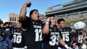 Oct 1, 2016; Boulder, CO, USA; Colorado Buffaloes quarterback Steven Montez (12) and Colorado Buffaloes running back Beau Bisharat (35) in the second half at Folsom Field. The Buffaloes defeated Beavers 47-6. Mandatory Credit: Ron Chenoy-USA TODAY Sports