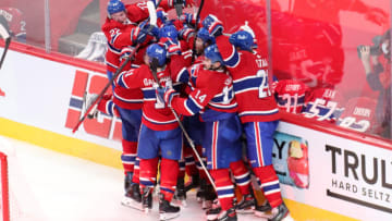 Jun 24, 2021; Montreal, Quebec, CAN; Montreal Canadiens players celebrate their win against Vegas Golden Knights after an overtime period in game six of the 2021 Stanley Cup Semifinals at Bell Centre. Mandatory Credit: Jean-Yves Ahern-USA TODAY Sports