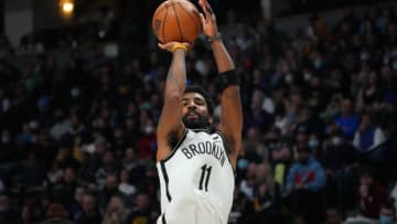 Feb 6, 2022; Denver, Colorado, USA; Brooklyn Nets guard Kyrie Irving (11) shoots the ball in the second half against the Denver Nuggets at Ball Arena. Mandatory Credit: Ron Chenoy-USA TODAY Sports