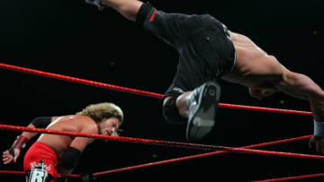 John Cena is thrown out of the ring by Edge Lita during the WWE RAW Superslam event at Acer Arena, Homebush Stadium in Sydney on August 4, 2006. (Photo by Don Arnold/WireImage)