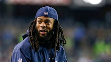 SEATTLE, WA - DECEMBER 03: Injured cornerback Richard Sherman of the Seattle Seahawks smiles from the sidelines before the game against the Philadelphia Eagles at CenturyLink Field on December 3, 2017 in Seattle, Washington. (Photo by Otto Greule Jr /Getty Images)