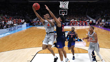SAN JOSE, CALIFORNIA - MARCH 24: Nickeil Alexander-Walker #4 of the Virginia Tech Hokies shoots against Elijah Cuffee #10 of the Liberty Flames in the second half during the second round of the 2019 NCAA Men's Basketball Tournament at SAP Center on March 24, 2019 in San Jose, California. (Photo by Yong Teck Lim/Getty Images)