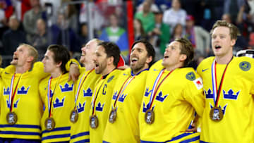 Joel Lundqvist (L) and Henrik Lundqvist of the New York Rangers. (Photo by Martin Rose/Getty Images)