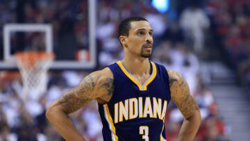 TORONTO, ON - APRIL 26: George Hill #3 of the Indiana Pacers looks on in the first half during Game Five of the Eastern Conference Quarterfinals against the Toronto Raptors during the 2016 NBA Playoffs at the Air Canada Centre on April 26, 2016 in Toronto, Ontario, Canada. NOTE TO USER: User expressly acknowledges and agrees that, by downloading and or using this photograph, User is consenting to the terms and conditions of the Getty Images License Agreement. (Photo by Vaughn Ridley/Getty Images)