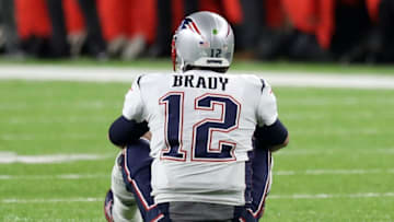 MINNEAPOLIS, MN - FEBRUARY 04: Tom Brady #12 of the New England Patriots reacts after fumbling the ball during the fourth quarter against the Philadelphia Eagles in Super Bowl LII at U.S. Bank Stadium on February 4, 2018 in Minneapolis, Minnesota.The Philadelphia Eagles defeated the New England Patriots 41-33. (Photo by Rob Carr/Getty Images)