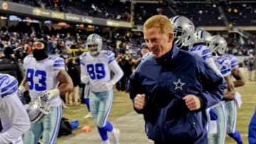 Dec 4, 2014; Chicago, IL, USA; Dallas Cowboys head coach Jason Garrett runs with players before their game against the Chicago Bears at Soldier Field. Mandatory Credit: Matt Marton-USA TODAY Sports