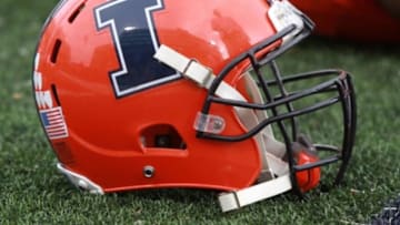 Oct 26, 2013; Champaign, IL, USA; Illinois Fighting Illini helmet on the field before the game against the Michigan State Spartans at Memorial Stadium. Mandatory Credit: Pat Lovell-USA TODAY Sports