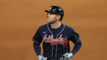 ARLINGTON, TEXAS - OCTOBER 18: Freddie Freeman #5 of the Atlanta Braves reacts after flying out to Mookie Betts (not pictured) of the Los Angeles Dodgersduring the fifth inning in Game Seven of the National League Championship Series at Globe Life Field on October 18, 2020 in Arlington, Texas. (Photo by Ronald Martinez/Getty Images)