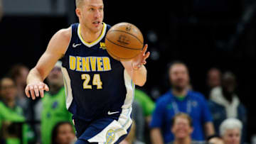 MINNEAPOLIS, MN - APRIL 11: Mason Plumlee #24 of the Denver Nuggets dribbles the ball against the Minnesota Timberwolves during the game on April 11, 2018 at the Target Center in Minneapolis, Minnesota. The Timberwolves defeated the Nuggets 112-106. NOTE TO USER: User expressly acknowledges and agrees that, by downloading and or using this Photograph, user is consenting to the terms and conditions of the Getty Images License Agreement. (Photo by Hannah Foslien/Getty Images)