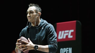 LAS VEGAS, NV - OCTOBER 03: Tony Ferguson prepares to throw a football into the crowd as he plays catch during an open workout for UFC 229 at Park Theater at Park MGM on October 03, 2018 in Las Vegas, Nevada. Ferguson will fight Anthony Pettis in a lightweight bout at UFC 229 on October 6 at T-Mobile Arena in Las Vegas. (Photo by Ethan Miller/Getty Images)