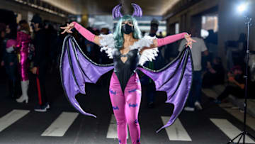 NEW YORK, NEW YORK - OCTOBER 08: A cosplayer poses as Morrigan Aensland from "Darkstalkers" during the second day of Comic Con at Javits Center on October 08, 2021 in New York City. (Photo by Roy Rochlin/Getty Images)