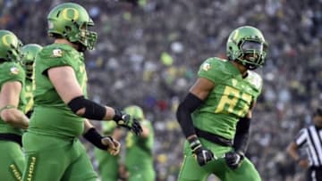 Jan 1, 2015; Pasadena, CA, USA; Oregon Ducks wide receiver Darren Carrington (87) celebrates making a touchdown against the Florida State Seminoles in the second half in the 2015 Rose Bowl college football game at Rose Bowl. Mandatory Credit: Gary Vasquez-USA TODAY Sports