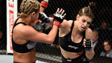 LAS VEGAS, NV - MARCH 03: (R-L) Mackenzie Dern punches Ashley Yoder in their women's strawweight bout during the UFC 222 event inside T-Mobile Arena on March 3, 2018 in Las Vegas, Nevada. (Photo by Jeff Bottari/Zuffa LLC/Zuffa LLC via Getty Images)
