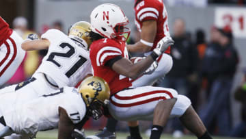 Nebraska football defender DeJon Gomes (7) is tackled after intercepting the pass against the Colorado Buffaloes receiver Toney Clemons(Bruce Thorson-USA TODAY Sports)