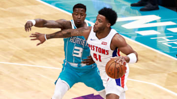 Terry Rozier #3 of the Charlotte Hornets defends Saddiq Bey #41 of the Detroit Pistons (Photo by Grant Halverson/Getty Images)