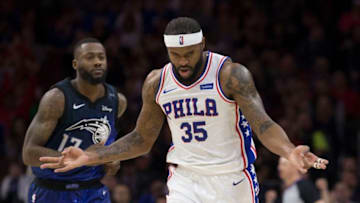 PHILADELPHIA, PA - FEBRUARY 24: Trevor Booker #35 of the Philadelphia 76ers reacts in front of Jonathon Simmons #17 of the Orlando Magic after making a three point basket in the fourth quarter at the Wells Fargo Center on February 24, 2018 in Philadelphia, Pennsylvania. The 76ers defeated the Magic 116-105. NOTE TO USER: User expressly acknowledges and agrees that, by downloading and or using this photograph, User is consenting to the terms and conditions of the Getty Images License Agreement. (Photo by Mitchell Leff/Getty Images)