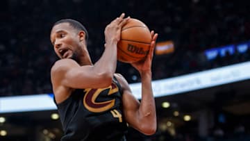 TORONTO, ON - OCTOBER 19: Evan Mobley #4 of the Cleveland Cavaliers grabs a rebound during the second half of their NBA game against the Toronto Raptors at Scotiabank Arena on October 19, 2022 in Toronto, Canada. NOTE TO USER: User expressly acknowledges and agrees that, by downloading and or using this photograph, User is consenting to the terms and conditions of the Getty Images License Agreement. (Photo by Cole Burston/Getty Images)