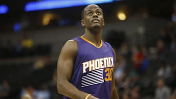 Feb 25, 2015; Denver, CO, USA; Phoenix Suns forward Earl Barron (30) during the second half against the Denver Nuggets at Pepsi Center. The Suns won 110-96. Mandatory Credit: Chris Humphreys-USA TODAY Sports