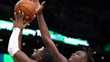 BOSTON, MASSACHUSETTS - JANUARY 15: Sekou Doumbouya #45 of the Detroit Pistons defends a shot from Jaylen Brown #7 of the Boston Celtics at TD Garden on January 15, 2020 in Boston, Massachusetts. The Pistons defeat the Celtics 116-103. (Photo by Maddie Meyer/Getty Images)