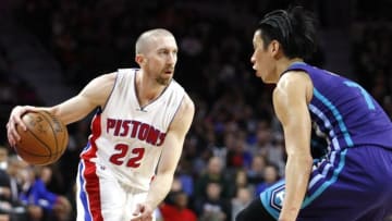 Mar 25, 2016; Auburn Hills, MI, USA; Detroit Pistons guard Steve Blake (22) dribbles the all as Charlotte Hornets guard Jeremy Lin (7) defends during the fourth quarter at The Palace of Auburn Hills. The Pistons won 112-105. Mandatory Credit: Raj Mehta-USA TODAY Sports