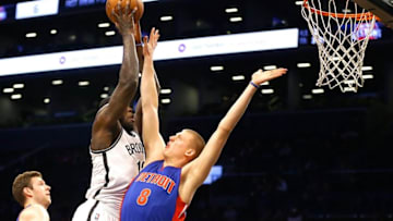 Oct 6, 2016; Brooklyn, NY, USA; Brooklyn Nets forward Anthony Bennett (13) goes up for a shot while being defended by Detroit Pistons forward Henry Ellenson (8)during the second half at Barclays Center. The Nets won 101-94. Mandatory Credit: Andy Marlin-USA TODAY Sports