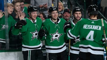 DALLAS, TX - DECEMBER 29: Radek Faksa #12, Tyler Pitlick #18, Roman Polak #45, Miro Heiskanen #4 and the Dallas Stars celebrate a goal against the Detroit Red Wings at the American Airlines Center on December 29, 2018 in Dallas, Texas. (Photo by Glenn James/NHLI via Getty Images)
