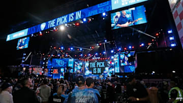 NASHVILLE, TENNESSEE - APRIL 25: Hometown fans of the Tennessee Titans react after their first round pick of Jeffery Simmons is announced on day 1 of the 2019 NFL Draft on April 25, 2019 in Nashville, Tennessee. (Photo by Frederick Breedon/Getty Images)