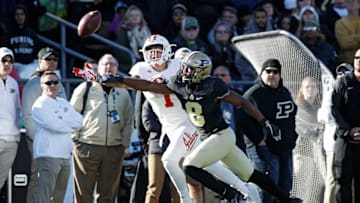 WEST LAFAYETTE, IN - NOVEMBER 25: Josh Okonye #8 of the Purdue Boilermakers defends a pass against Simmie Cobbs Jr. #1 of the Indiana Hoosiers in the fourth quarter of a game at Ross-Ade Stadium on November 25, 2017 in West Lafayette, Indiana. Purdue defeated Indiana 31-24. (Photo by Joe Robbins/Getty Images)