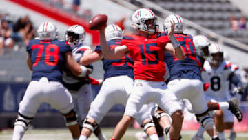 TUCSON, ARIZONA - APRIL 24: Quarterback Will Plummer #15 of the Arizona Wildcats (Team Blue) throws a pass during the Arizona Spring game at Arizona Stadium on April 24, 2021 in Tucson, Arizona. (Photo by Christian Petersen/Getty Images)