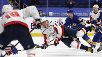 Jan 14, 2021; Buffalo, New York, USA; Washington Capitals left wing Alex Ovechkin (8) takes a shot on goal during the first period against the Buffalo Sabres at KeyBank Center. Mandatory Credit: Timothy T. Ludwig-USA TODAY Sports