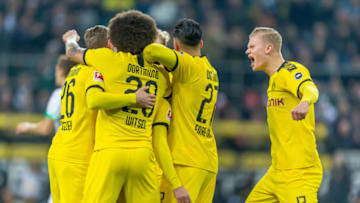 MOENCHENGLADBACH, GERMANY - MARCH 07: (BILD ZEITUNG OUT) Thorgan Hazard of Borussia Dortmund celebrates after scoring his team's first goal with teammates during the Bundesliga match between Borussia Moenchengladbach and Borussia Dortmund at Borussia-Park on March 7, 2020 in Moenchengladbach, Germany. (Photo by Mario Hommes/DeFodi Images via Getty Images)