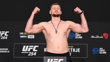 ABU DHABI, UNITED ARAB EMIRATES - OCTOBER 23: In this handout image provided by UFC, Alexander Volkov of Russia poses on the scale during the UFC 254 weigh-in on October 23, 2020 on UFC Fight Island, Abu Dhabi, United Arab Emirates. (Photo by Josh Hedges/Zuffa LLC via Getty Images)