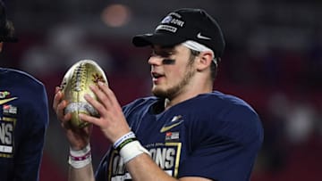 GLENDALE, AZ - DECEMBER 30: Trace McSorley #9 of the Penn State Nittany Lions holds the championship trophy after beating the Washington Huskies 35-28 in the Playstation Fiesta Bowl at University of Phoenix Stadium on December 30, 2017 in Glendale, Arizona. (Photo by Norm Hall/Getty Images)