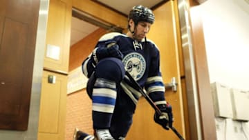 COLUMBUS, OH - JANUARY 23: R.J. Umberger #18 of the Columbus Blue Jackets stretches before a game against the Philadelphia Flyers on January 23, 2014 at Nationwide Arena in Columbus, Ohio. (Photo by Jamie Sabau/NHLI via Getty Images)