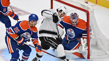 Apr 17, 2023; Edmonton, Alberta, CAN; Edmonton Oilers defenseman Darnell Nurse battles with Los Angeles Kings centre Quinton Byfield (55) as Oilers goalie Stuart Skinner (74) defends during the second period in game one of the first round of the 2023 Stanley Cup Playoffs at Rogers Place. Mandatory Credit: Walter Tychnowicz-USA TODAY Sports