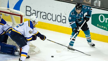 Mar 22, 2016; San Jose, CA, USA; San Jose Sharks center Joe Pavelski (8) tries to shoot as St. Louis Blues center David Backes (42) defends in the 3rd period at SAP Center at San Jose. Mandatory Credit: John Hefti-USA TODAY Sports The Blues won 1-0.