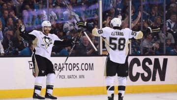 Jun 6, 2016; San Jose, CA, USA; Pittsburgh Penguins defenseman Ian Cole (28) celebrates with defenseman Kris Letang (58) after scoring a goal against the San Jose Sharks in the first period in game four of the 2016 Stanley Cup Final at SAP Center at San Jose. Mandatory Credit: Kyle Terada-USA TODAY Sports