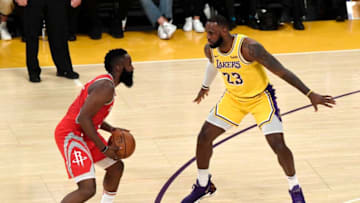 LOS ANGELES, CA - OCTOBER 20: LeBron James #23 of the Los Angeles Lakers defends against James Harden #13 of the Houston Rockets as he makes his home debut at Staples Center on October 20, 2018 in Los Angeles, California. NOTE TO USER: User expressly acknowledges and agrees that, by downloading and or using this photograph, User is consenting to the terms and conditions of the Getty Images License Agreement. (Photo by Kevork Djansezian/Getty Images)