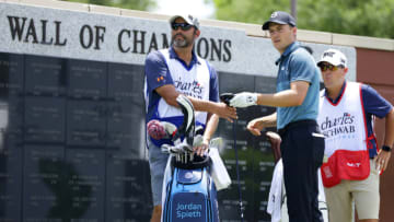 May 29, 2021; Fort Worth, Texas, USA; Jordan Spieth and his caddie Michael Greller look over the first tee during the third round of the Charles Schwab Challenge golf tournament. Mandatory Credit: Erich Schlegel-USA TODAY Sports