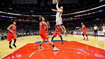 Nov 9, 2016; Los Angeles, CA, USA; Los Angeles Clippers forward Blake Griffin (32) shoots against Portland Trail Blazers forward Meyers Leonard (11) during the second half of a NBA basketball game at Staples Center. Mandatory Credit: Kirby Lee-USA TODAY Sports