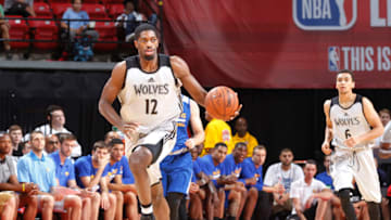 LAS VEGAS, NV - JULY 12: Amile Jefferson #12 of the Minnesota Timberwolves handles the ball against the Golden State Warriors during the 2017 Summer League on July 12, 2017 at the Thomas & Mack Center in Las Vegas, Nevada. NOTE TO USER: User expressly acknowledges and agrees that, by downloading and or using this Photograph, user is consenting to the terms and conditions of the Getty Images License Agreement. Mandatory Copyright Notice: Copyright 2017 NBAE (Photo by Jack Arent/NBAE via Getty Images)