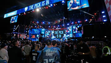 NASHVILLE, TENNESSEE - APRIL 25: Hometown fans of the Tennessee Titans react after their first round pick of Jeffery Simmons is announced on day 1 of the 2019 NFL Draft on April 25, 2019 in Nashville, Tennessee. (Photo by Frederick Breedon/Getty Images)